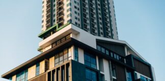 a tall building with a clock on the top of it