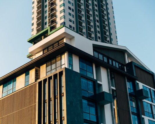 a tall building with a clock on the top of it