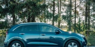 blue car parked on the side of the road