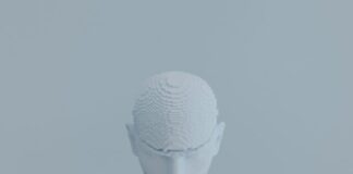 a white mannequin wearing a white mask