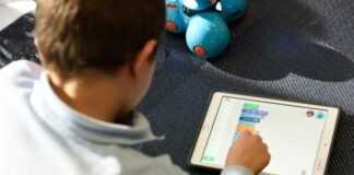 man using silver iPad