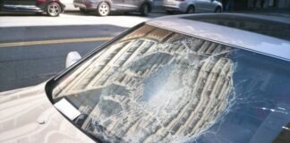 blue car with white snow on top