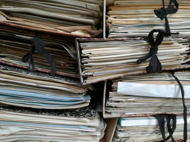 Photo by Sear Greyson brown binder lot