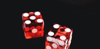 two red-and-white dices