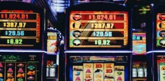 a row of slot machines sitting next to each other