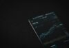 Decoding the Difference: Crypto Exchanges vs. Forex black android smartphone on black textile