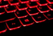 Exploring the Future of iGaming with Cloud and AI Technologies black and red laptop keyboard