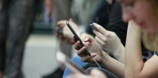 person holding black phone