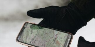 person holding iphone 6 with case