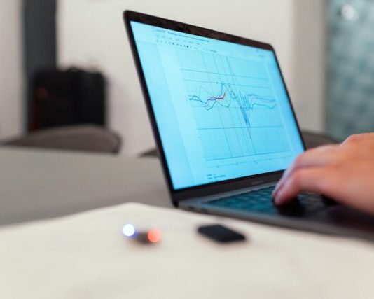 person using black laptop computer