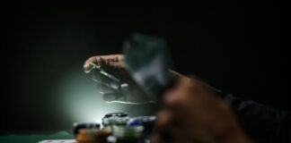 selective focus photography of poker chips