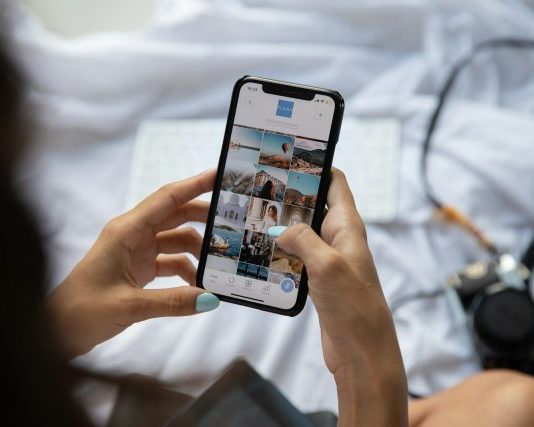 person holding white samsung android smartphone