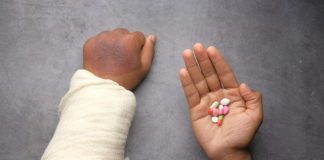 person holding babys hand