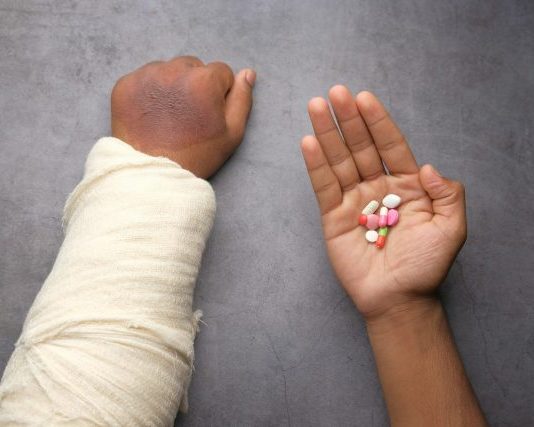 person holding babys hand