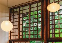 Types of Wood for Custom Windows: Which One Should You Choose? a couple of lights hanging from the side of a window