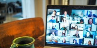 macbook pro displaying group of people