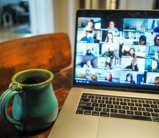 macbook pro displaying group of people