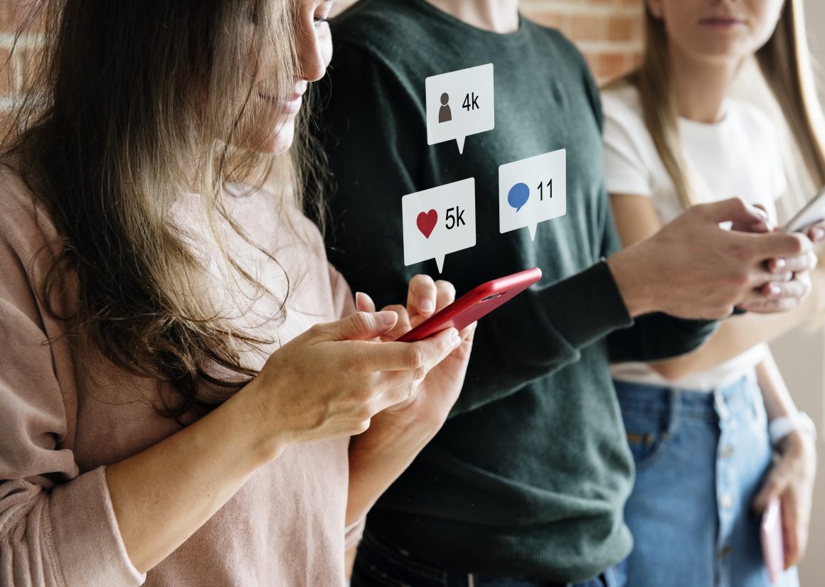 A group of people using their phones AI-generated content may be incorrect.