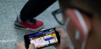 person holding black android smartphone