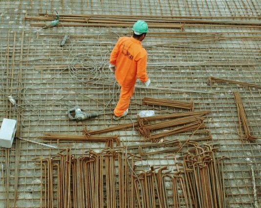 man walking on construction site