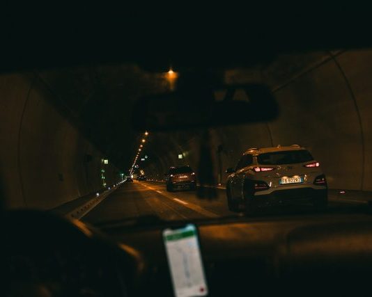 cars on road during night time
