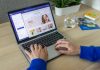 Driving E-Commerce Growth with Innovative Magento Solutions a person typing on a laptop on a table