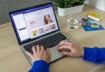 Driving E-Commerce Growth with Innovative Magento Solutions a person typing on a laptop on a table