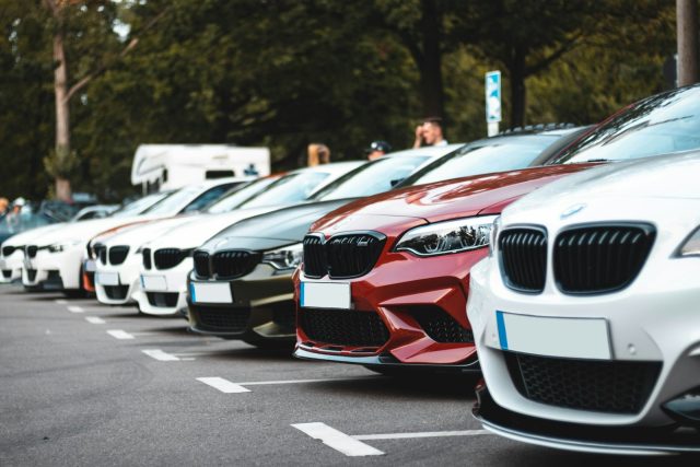 Photo by Sara Kurfeß white and red bmw m 3 on road during daytime