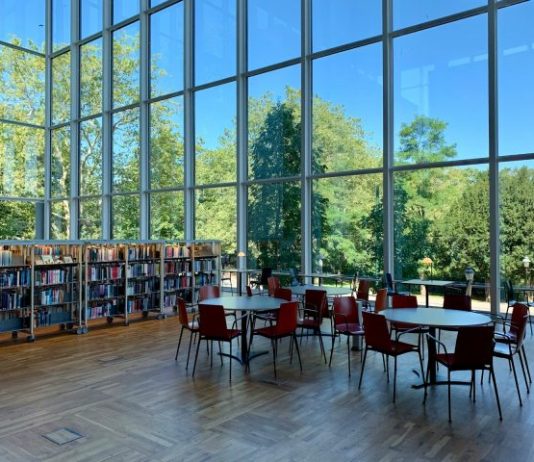 three round white wooden tables