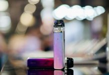 a close up of two electronic devices on a table