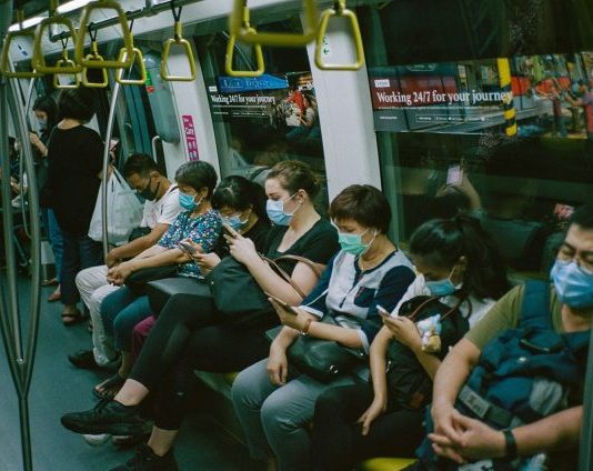 people sitting on train seat