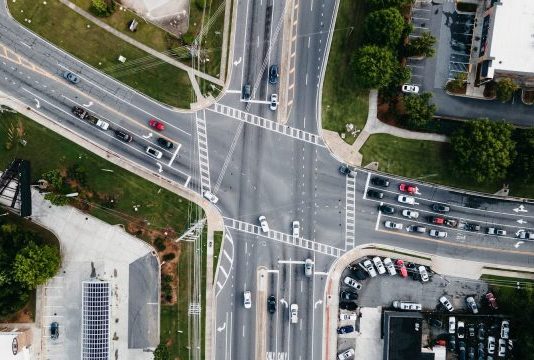 an aerial view of a busy intersection in a city