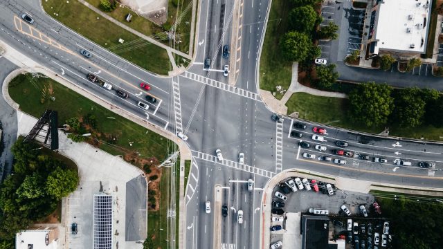an aerial view of a busy intersection in a city